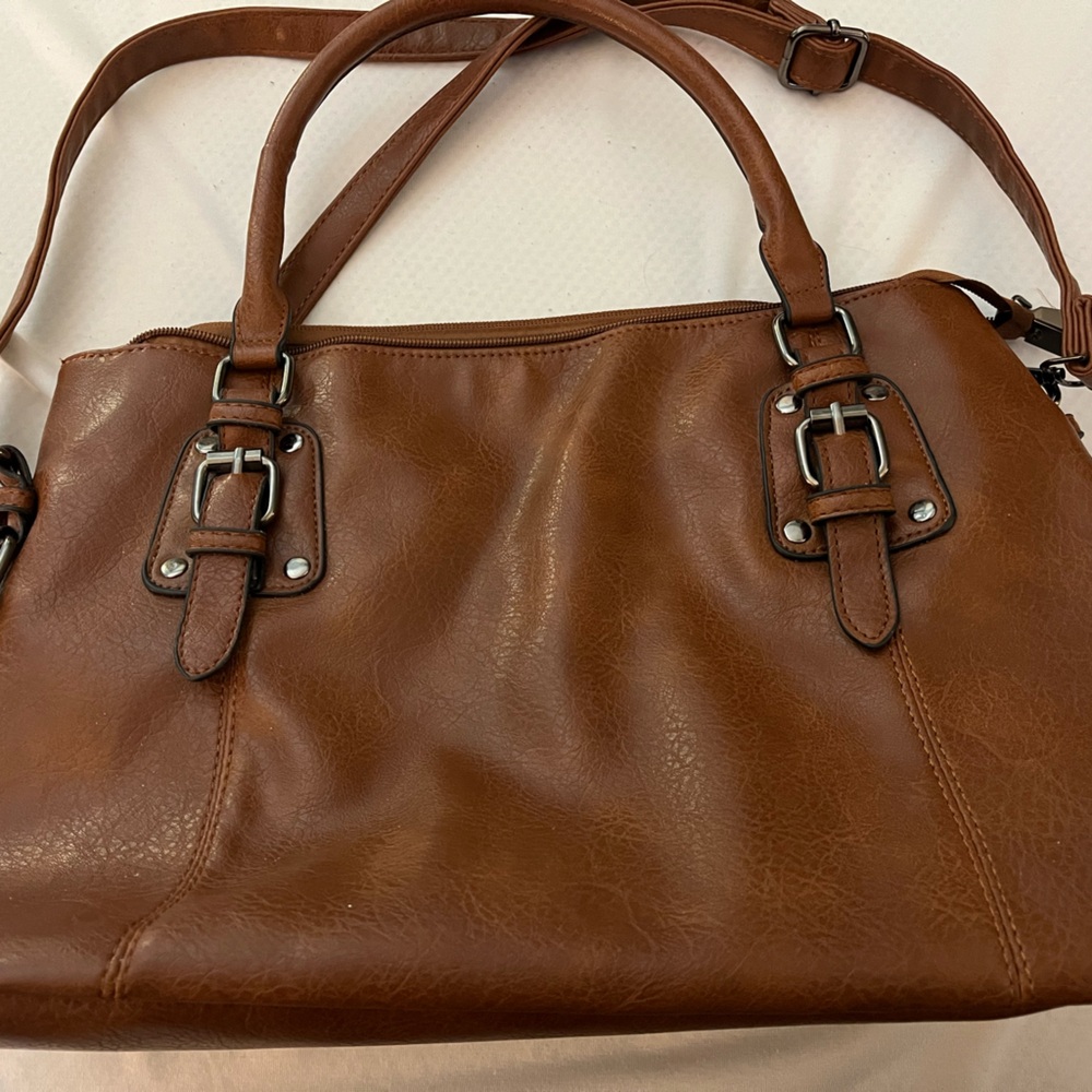 Brown, leather-like, unbranded bag with silver hardware